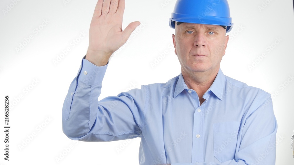 Businessman wearing Engineer Helmet Salute with a Hand Gestures Businessman wearing Engineer Helmet Salute with a Hand Gestures