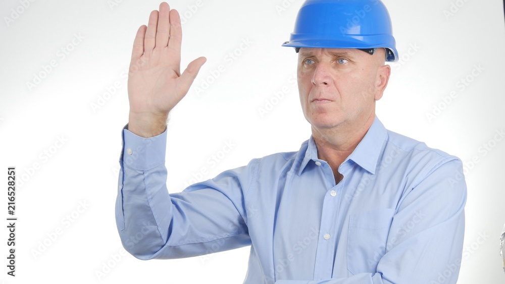 Businessman wearing Engineer Helmet Salute with a Hand Gestures Businessman wearing Engineer Helmet Salute with a Hand Gestures