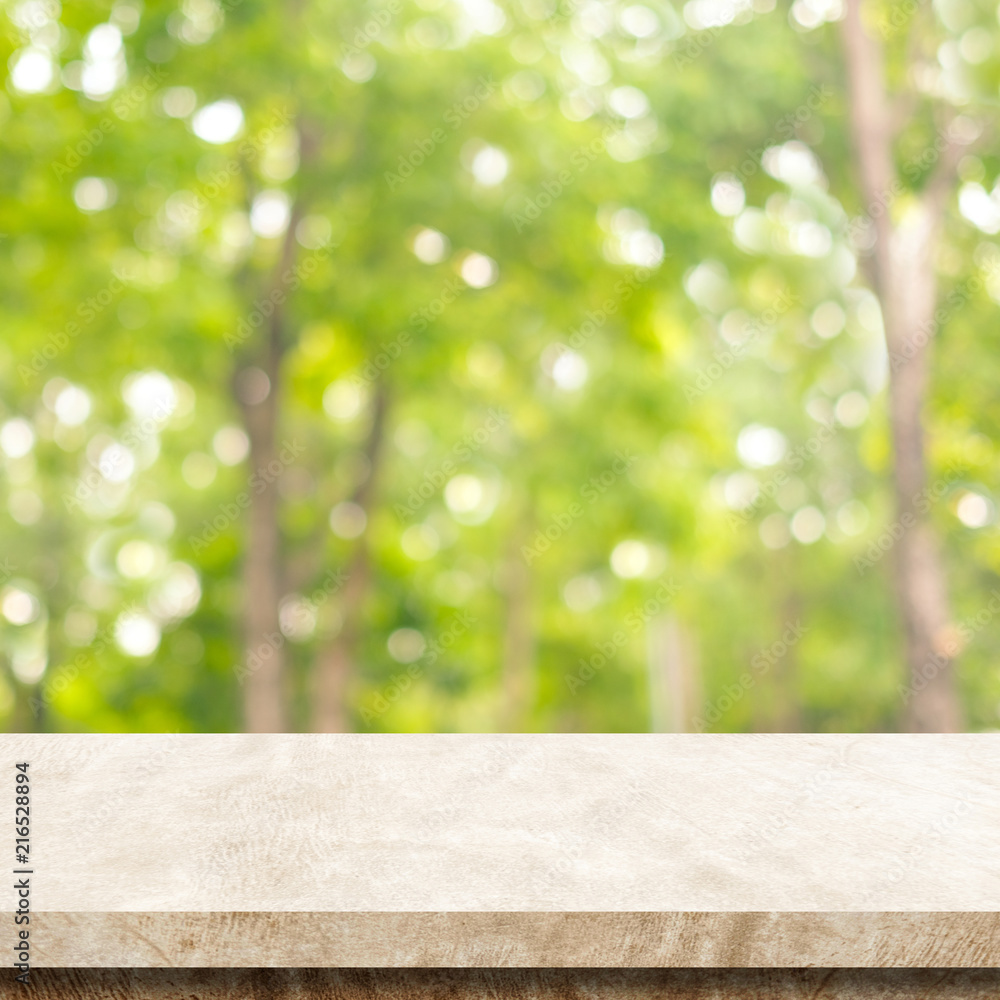 Empty brown cement table over blur green nature park background, product  display montage Stock Photo | Adobe Stock