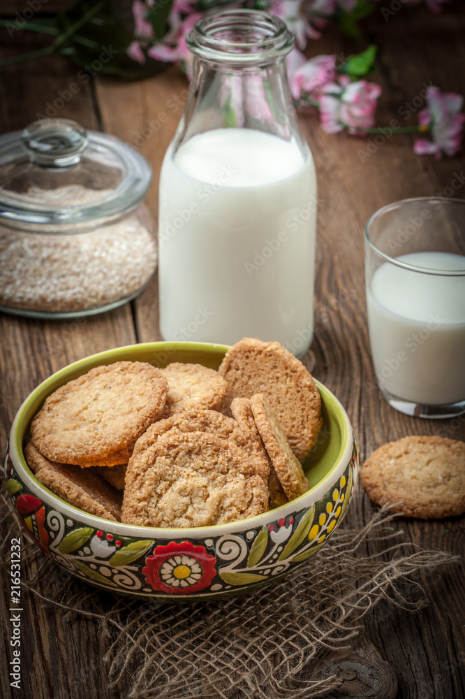 Stack of freshly baked oat biscuits in a bowl. Stack of freshly baked oat biscuits in a bowl.