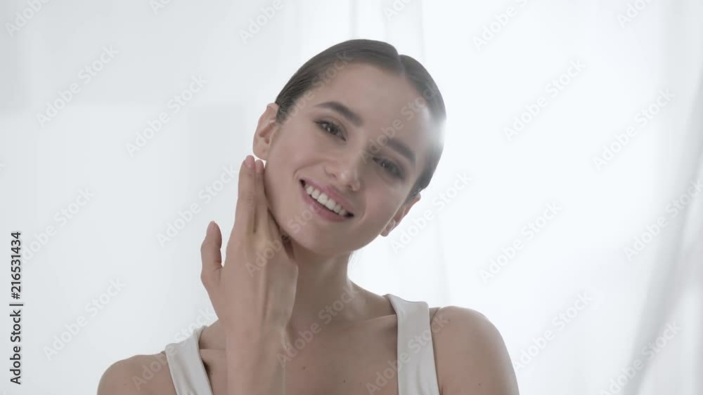 Beauty Care. Woman With Healthy Skin Touching Face And Smiling
