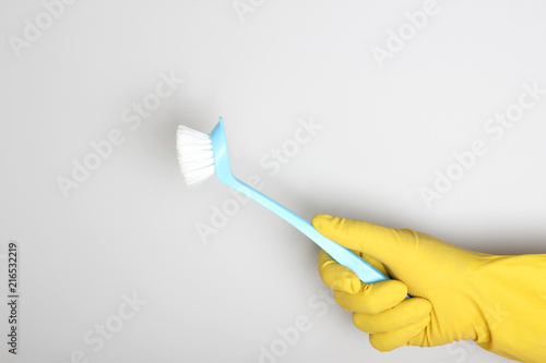 yellow glove brush blue cleaning clean