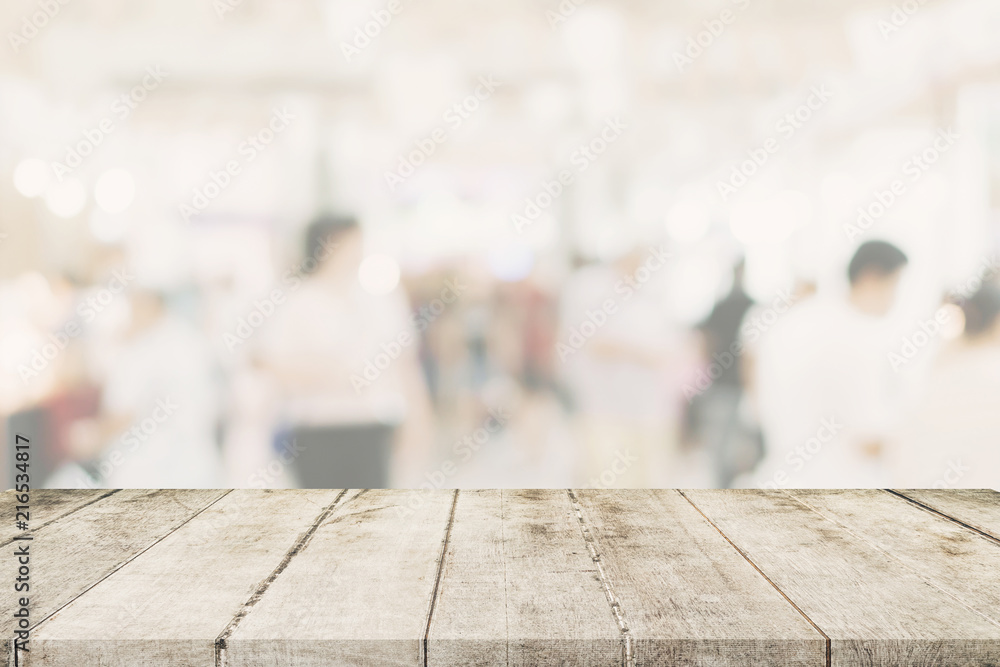 Empty wooden table with blurred abstract people on cafe on restaurant background. Empty wooden table with blurred abstract people on cafe on restaurant background.