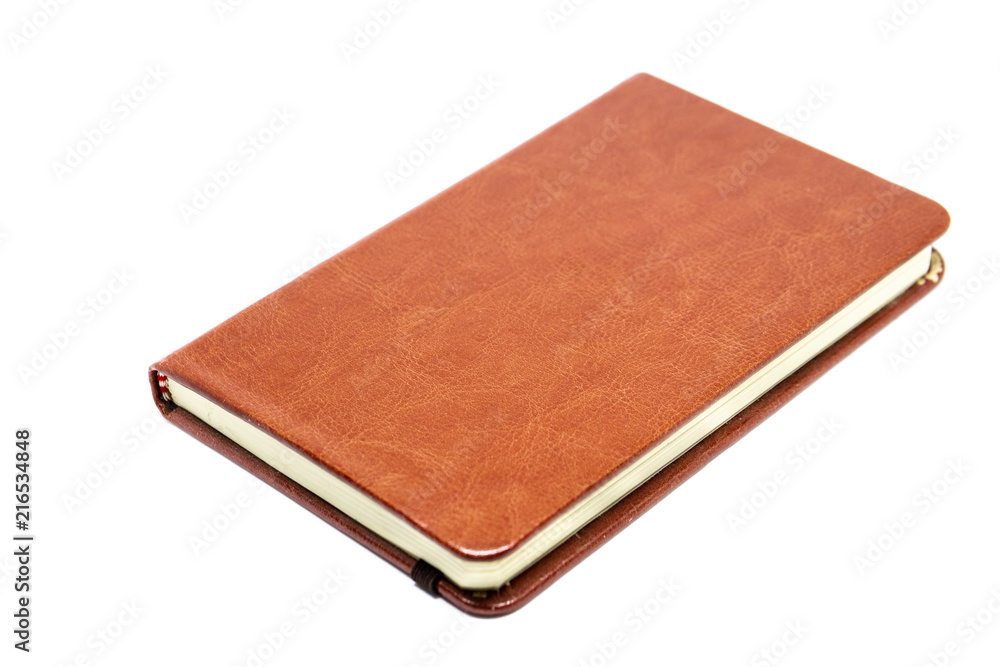 Classic leather notebook close up isolated. Classic leather notebook close up isolated.