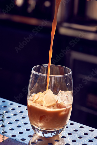 Cappuccino with ice with a transparent glass