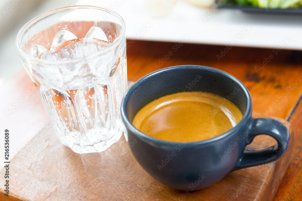 Shot of espresso served with soda water close up. Shot of espresso served with soda water close up.