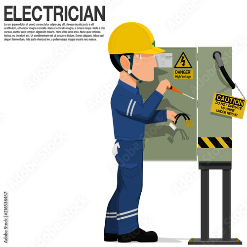 An electrical worker is fixing the electrical cabinet