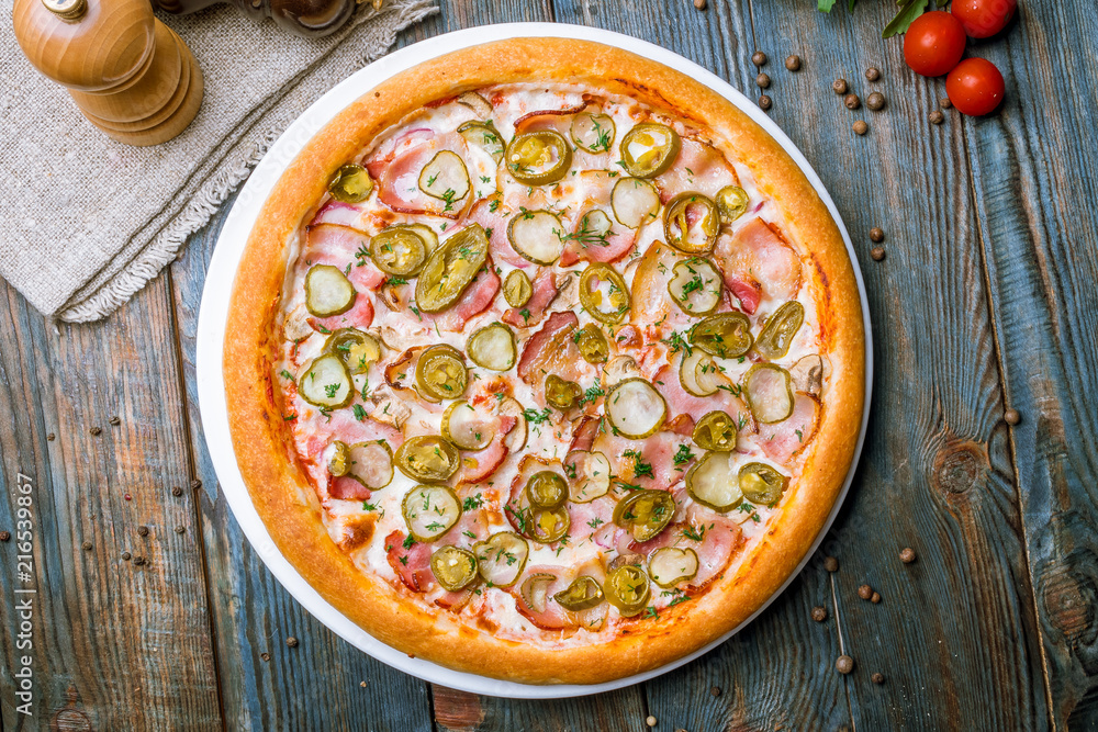 Spicy pizza with bacon and jalapeno