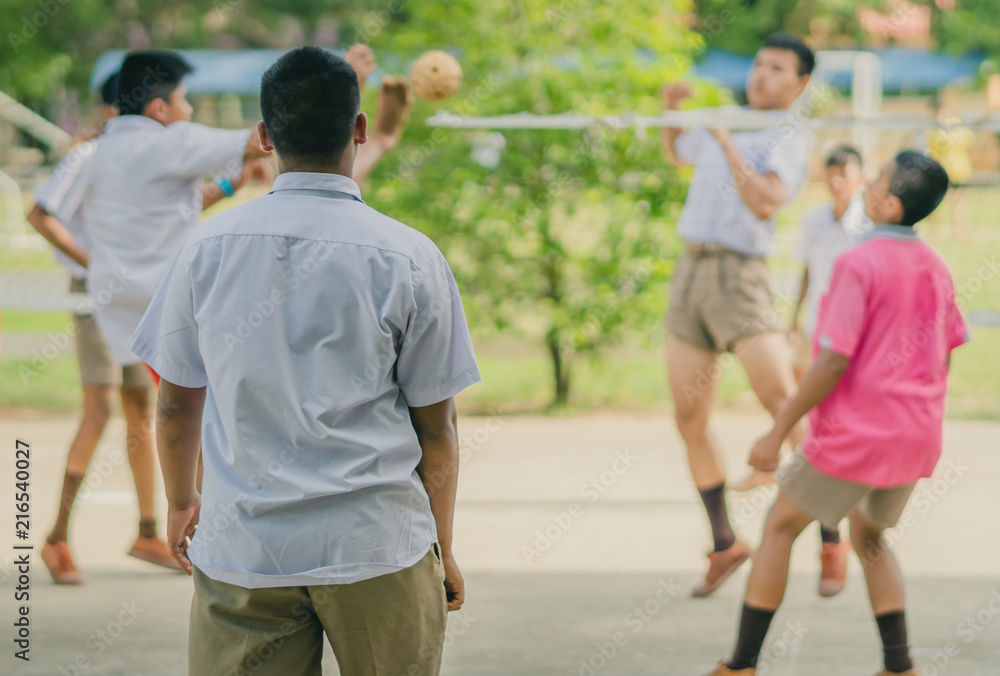 Happiness Students play sepak takraw in the afternoon. Happiness Students play sepak takraw in the afternoon.
