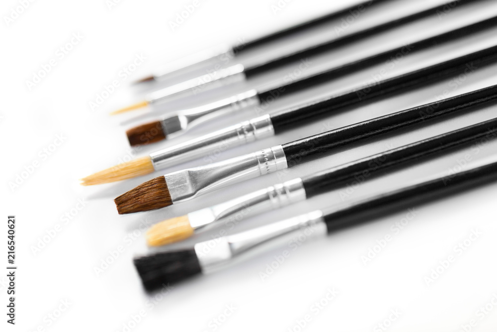 Set of artistic brushes, isolated on white background Set of artistic brushes, isolated on white background