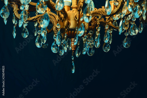 Crystal chandelier close-up. Dark background