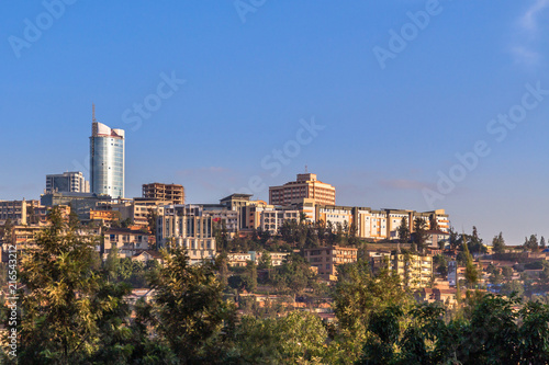 Rwandan capital downtown ladscape with living houses and busines photo