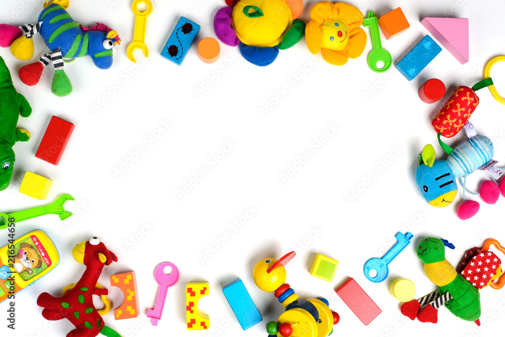 Baby toys frame. Colorful kids toys on white background. Copy space for