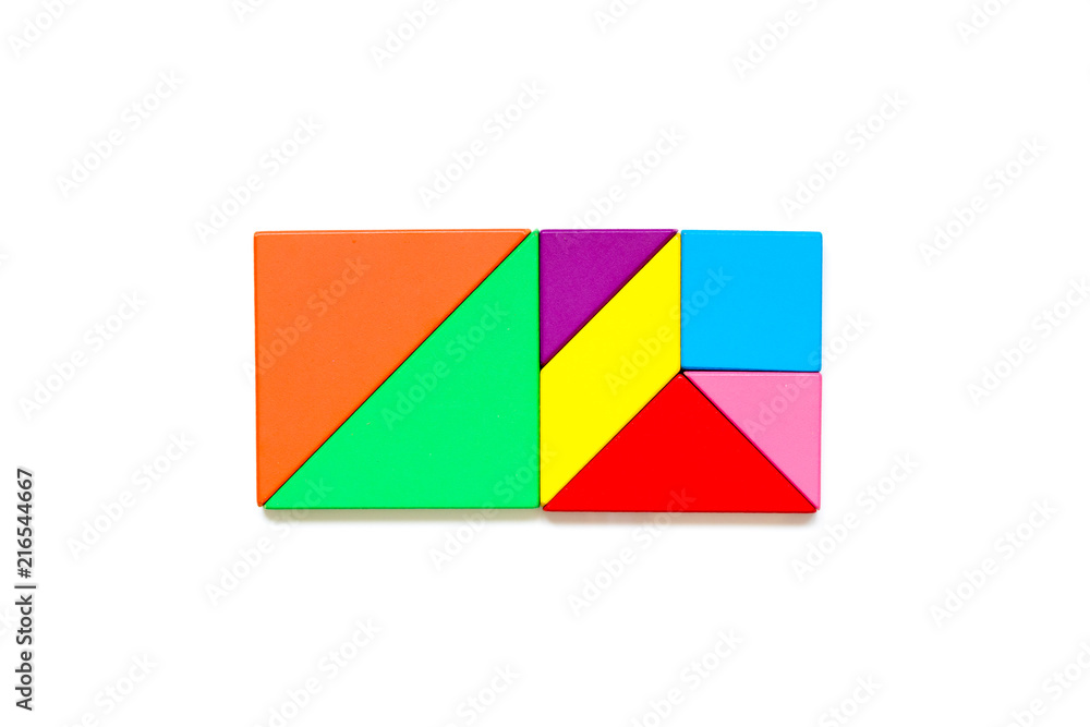 Color wood tangram puzzle in rectangle shape on white background