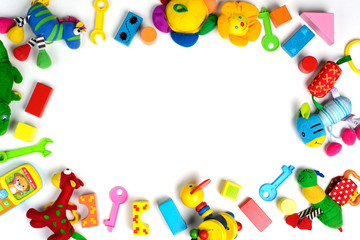 Baby toys frame. Colorful kids toys on white background. Copy space for text. Top view. Flat lay.