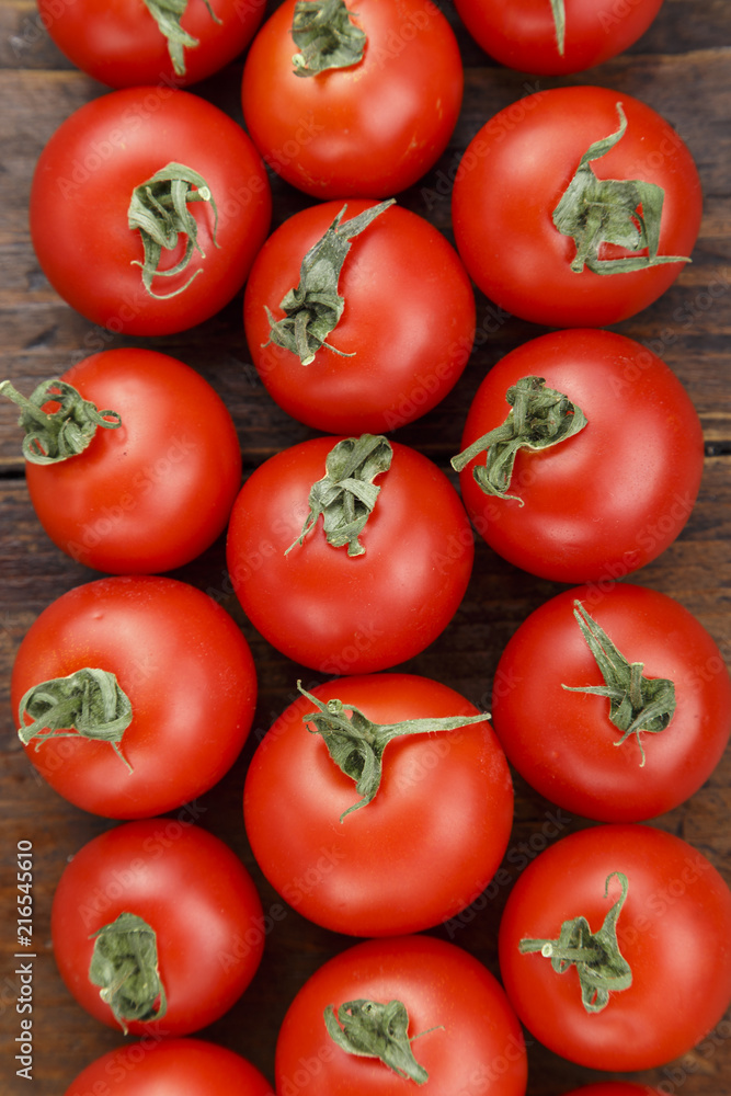 red tomatoes as background red tomatoes as background