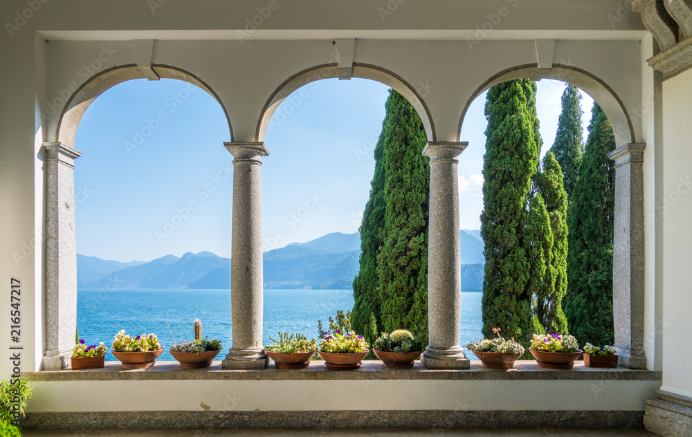Naklejka premium The beautiful Villa Monastero in Varenna on a sunny summer day. Lake Como, Lombardy, Italy.