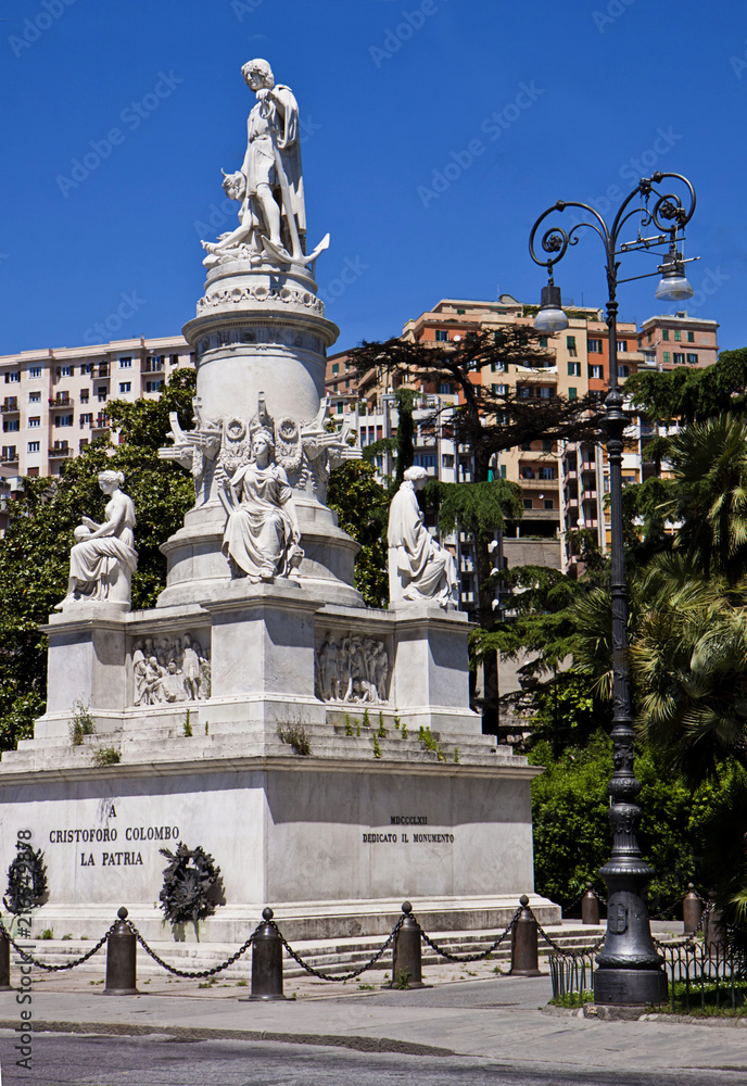 Genoa, Italy -  monument to Christopher Columbus in Piazza Acquaverde, built in 1862. At the four corners of the pedestal 4 statues symbolizing nautics, religion, cautiousness and strength