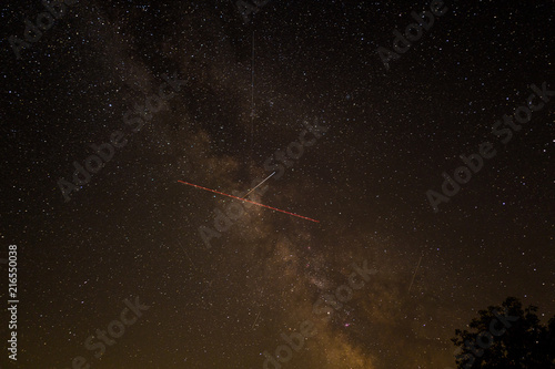 The Milky way with trail of ISS and an aeroplane