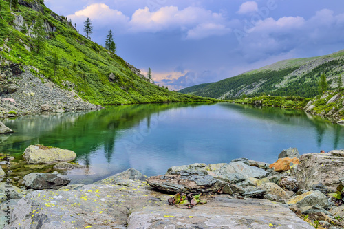 One from seven mountain Karakol lakes in Altai Mountains, Russia