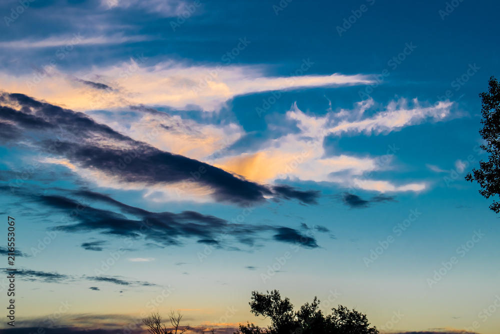 Natural background, natural, bright and rich texture. Sky with clouds. Warm weather. Spectacular colors.