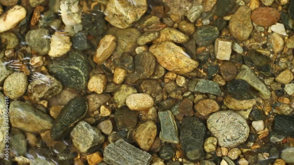Small Rocks and Pebble Stones on a Creek Spring Small Rocks and Pebble Stones on a Creek Spring