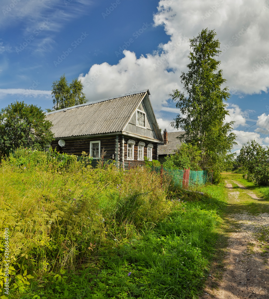 Fototapeta premium Old wooden log houses in the countryside.