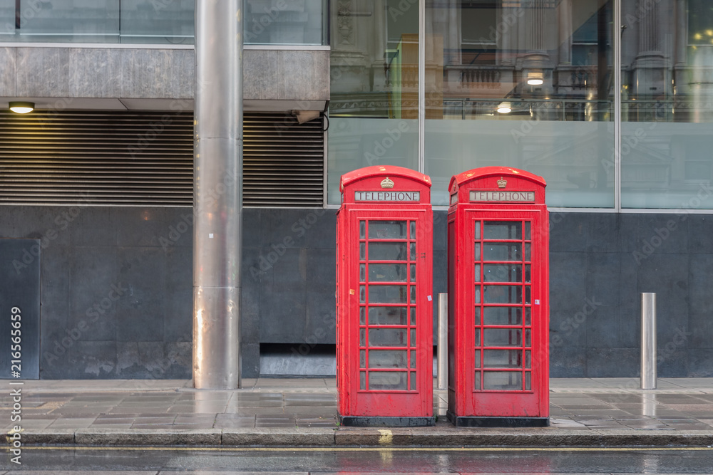 Foto The two red telephone boxes , famous icons of London,