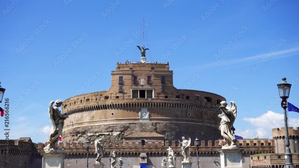 Frontal view of medieval castle from Sant'Angelo bridge. Castello St. Angelo fortress on sunny day in Rome, Italy in slow motion. No people Frontal view of medieval castle from Sant'Angelo bridge. Castello St. Angelo fortress on sunny day in Rome, Italy in slow motion. No people