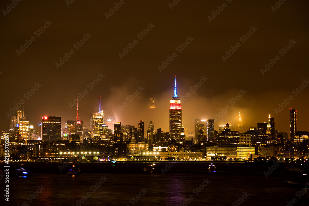 Naklejka premium Empire State Building after July 4th Independence day fireworks