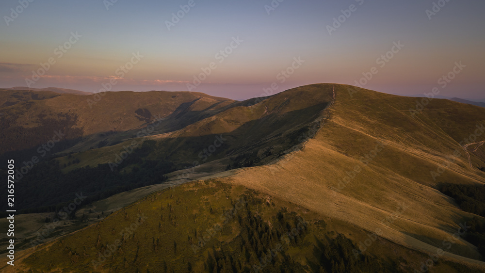 Aerial view of Svidovets ridge. Footage of Carpathian mountains in Ukraine during sunset done by drone