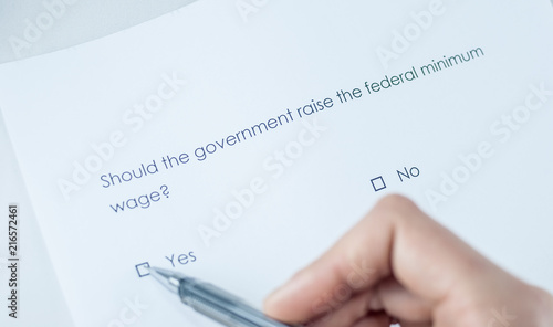Survey question: Should the government raise the federal minimum wage? Answer: Yes.