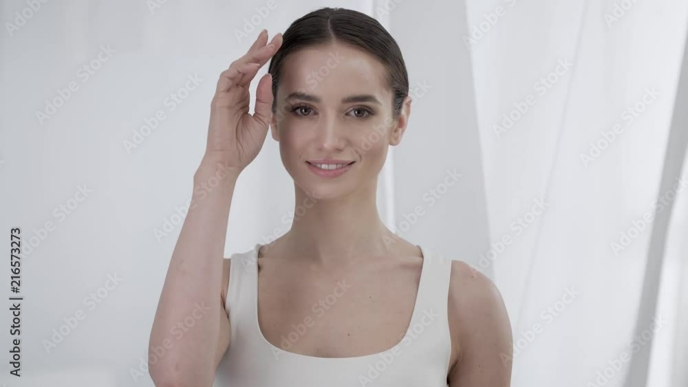 Woman Beauty. Portrait Beautiful Smiling Girl Touching Face Skin Woman Beauty. Portrait Beautiful Smiling Girl Touching Face Skin