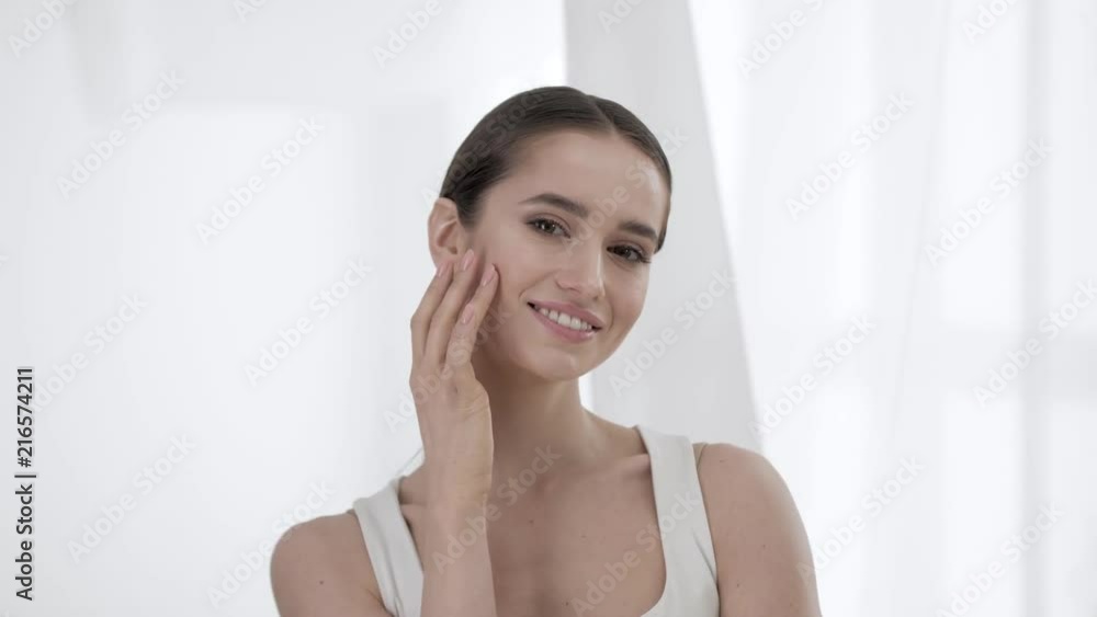 Beauty Skin. Attractive Woman Touching Face By Fingers Portrait Beauty Skin. Attractive Woman Touching Face By Fingers Portrait