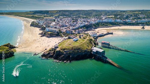 Aerial drone view of a picturesque and colorful coastal holiday town (Tenby, UK) photo
