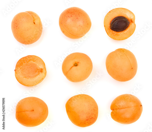 Apricot fruits isolated on white background. Top view. Flat lay pattern. Set or collection