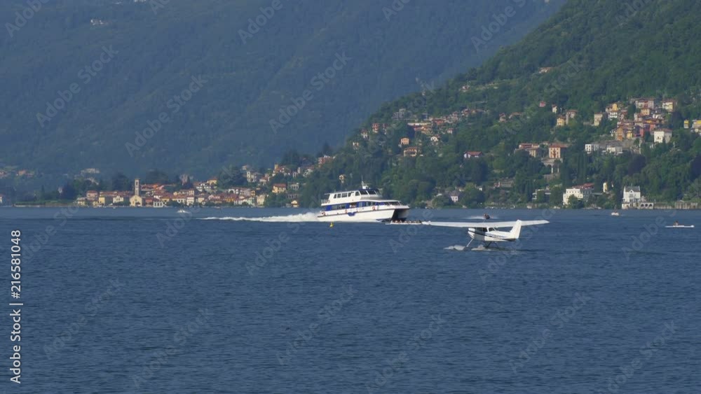 Floatplane preparing to take off on Lake Como in Italy Floatplane preparing to take off on Lake Como in Italy
