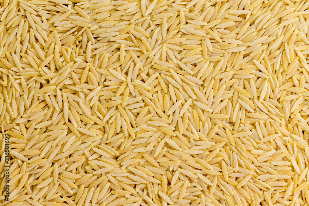 Background texture of dried Italian orzo pasta Background texture of dried Italian orzo pasta