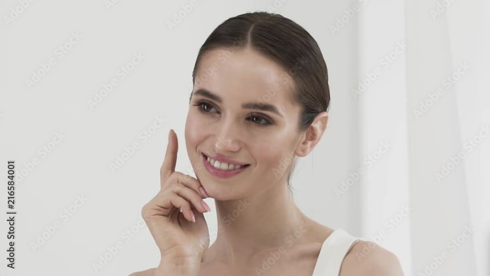 Beauty Skin. Attractive Woman Touching Face By Fingers Portrait Beauty Skin. Attractive Woman Touching Face By Fingers Portrait