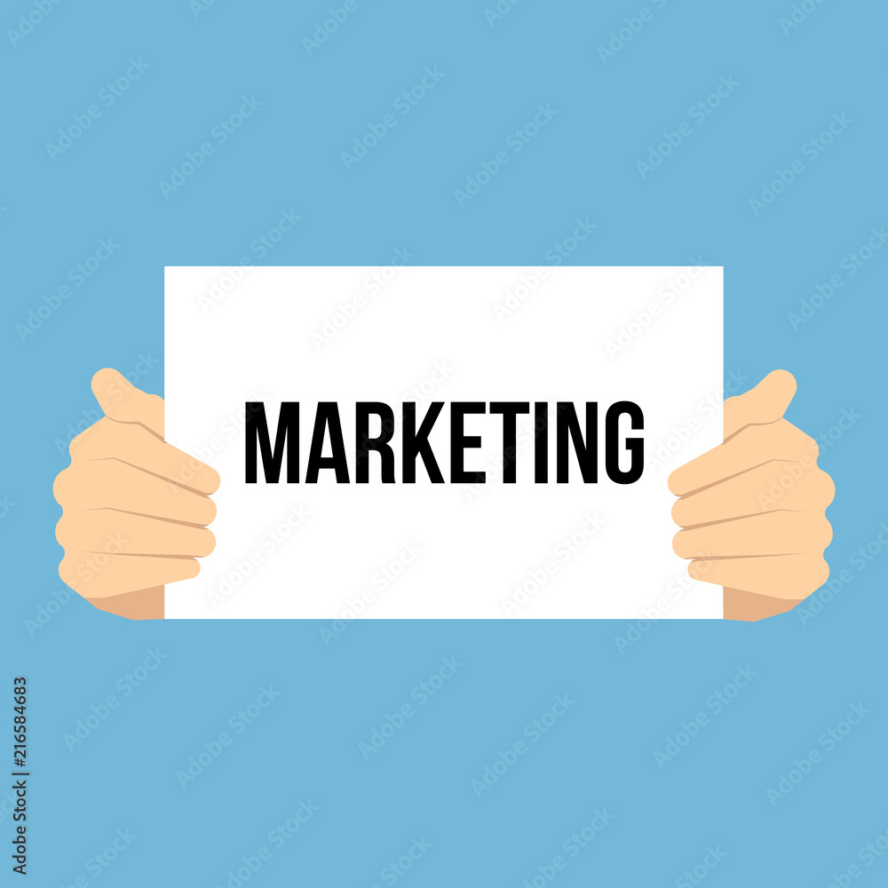 Man showing paper MARKETING text Man showing paper MARKETING text