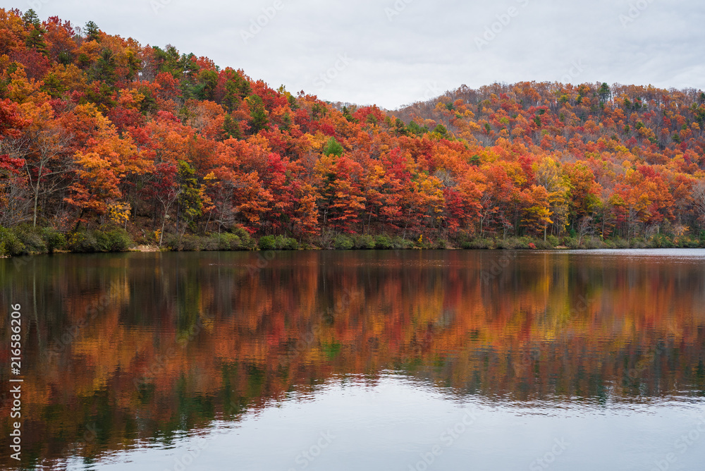 Autumn reflections at Sherando Lake, near the Blue Ridge Parkway in George Washington National Forest, Virginia. Autumn reflections at Sherando Lake, near the Blue Ridge Parkway in George Washington National Forest, Virginia.
