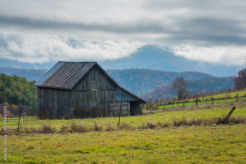 Barn and low clouds over the Blue Ridge Mountains, seen from the Blue Ridge Parkway in Virginia.