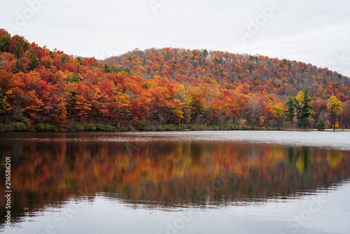 Autumn reflections at Sherando Lake  near the Blue Ridge Parkway in George Washington National Forest  Virginia.