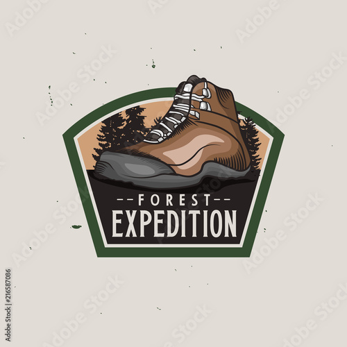 Forest expedition vintage colorful logotype with hiking trekking shoe, vintage badge