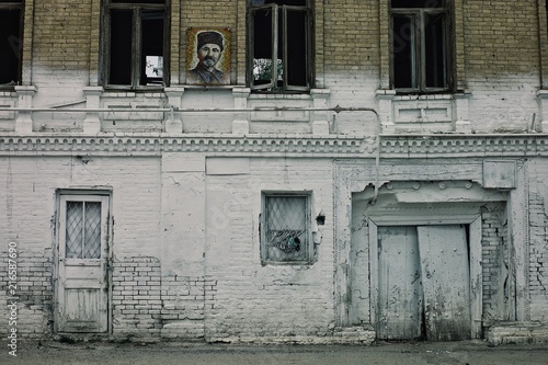 Bukhara / Uzbekistan - MAY 5 2010: abandoned building in the ancient city deep in the desert of the ex soviet union state photo