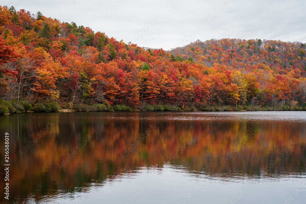 Autumn reflections at Sherando Lake, near the Blue Ridge Parkway in George Washington National Forest, Virginia. Autumn reflections at Sherando Lake, near the Blue Ridge Parkway in George Washington National Forest, Virginia.