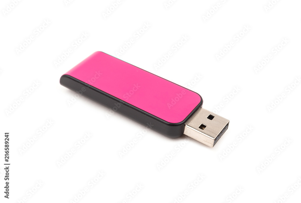 USB Pink flash drive memory on a white background, selective focus USB Pink flash drive memory on a white background, selective focus