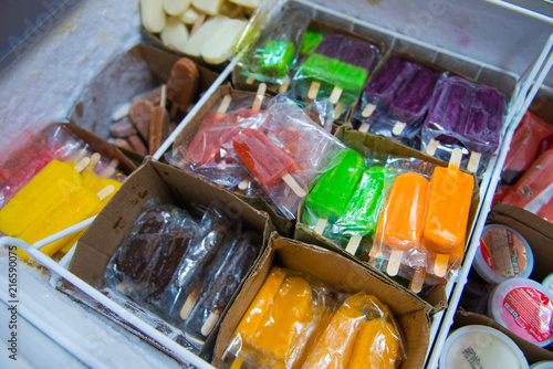 Many flavors of Ice cream in the freezer at convenience store