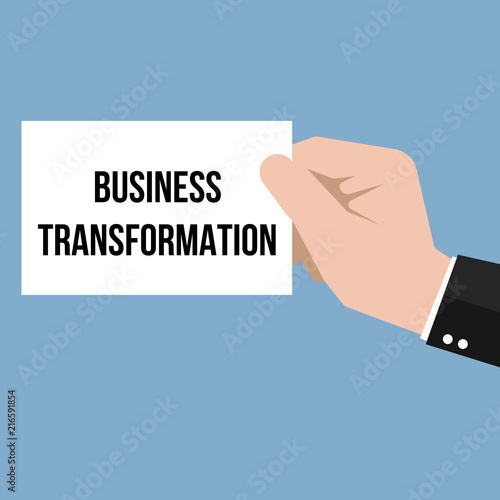 Man showing paper BUSINESS TRANSFORMATION text