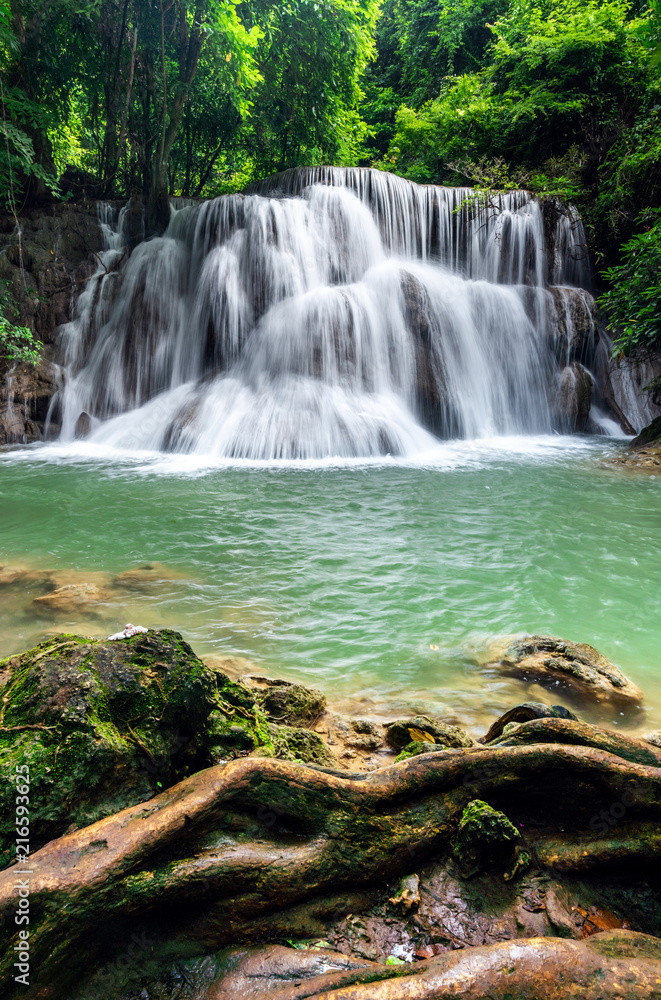 Beautiful waterfall in tropical rainforest at Kanchanaburi province, Thailand